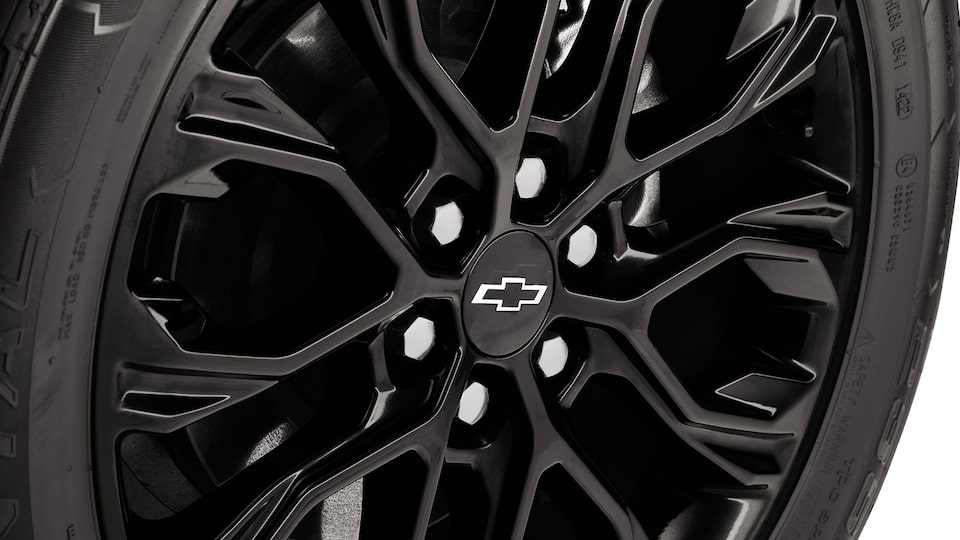 Dale un look diferenciado a tu Chevrolet Blazer 2025 con el centro de rin en negro con emblema para camioneta mediana